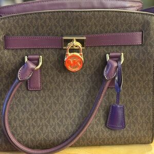 Authentic Michael Kors dark brown and purple purse.  Light use